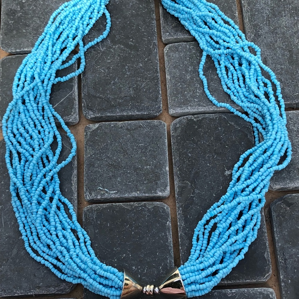Turquoise beaded necklace with silver hardware